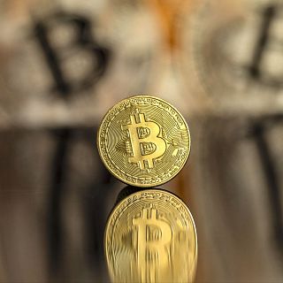 Un bitcoin por 100.000 dólares: hitos de la criptomeda