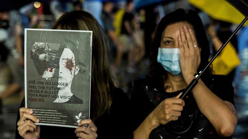 Calma bajo la lluvia en una desafiante manifestación masiva en Hong Kong - Escuchar ahora