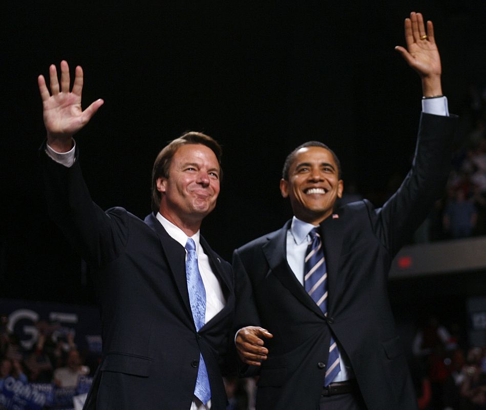 US Democratic presidential candidate Senator Obama stands with former Democratic challenger Edwards in Grand Rapids