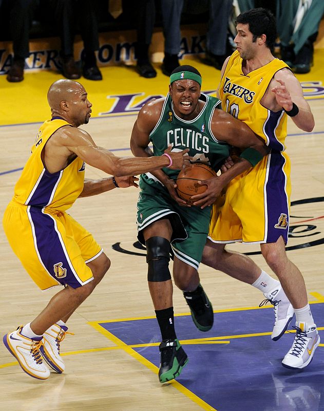 Celtics Pierce is defended by Lakers'  Fisher and Radmanovic during Game 4 of the NBA Finals basketball championship in Los Angeles