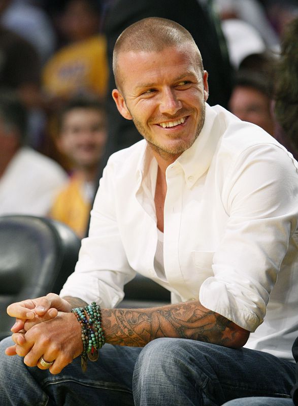 Los Angeles Galaxy soccer player Beckham watches the Los Angeles Lakers face the Boston Celtics in Los Angeles