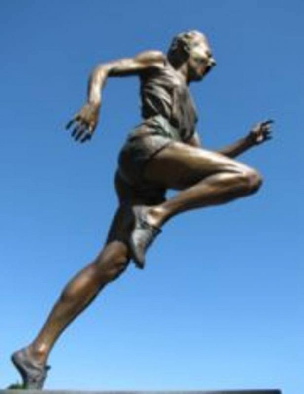 Estatua de la atleta australiana Betty Cuthbert que ganó tres medallas de oro