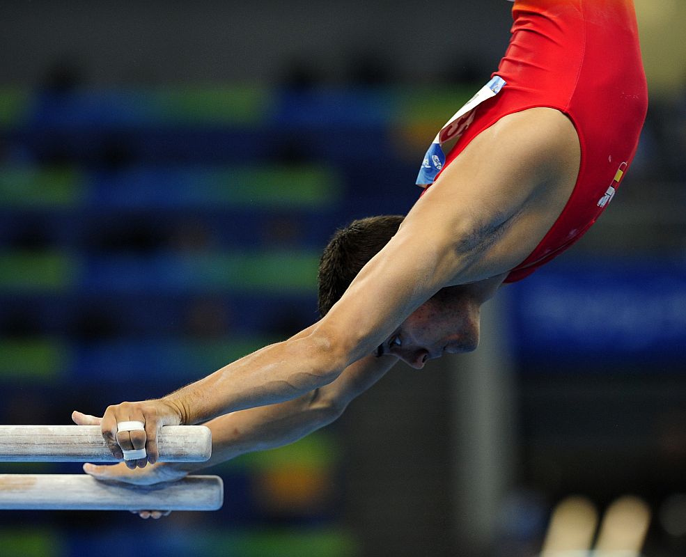 Rafael Martinez of Spain competes in the men's qualification parallel bars during the artistic gymnastics competition at the Beijing 2008 Olympic Games