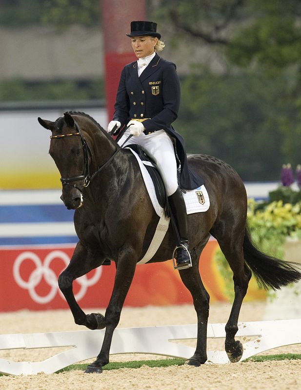 Ingrid Klimke of Germany rides Abraxxas during the equestrian eventing dressage competition at the Beijing 2008 Olympic Games in Hong Kong