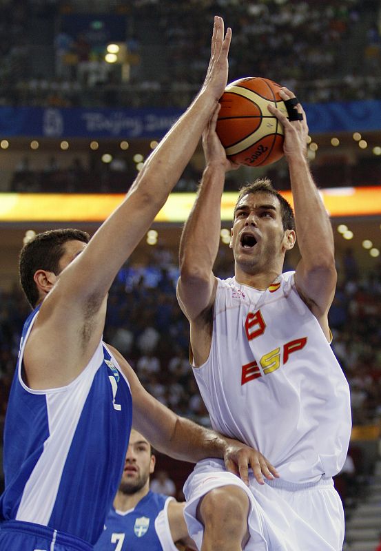 Calderon of Spain goes for basket against Tsartsaris of Greece during B men's basketball game at Beijing 2008 Olympic Games