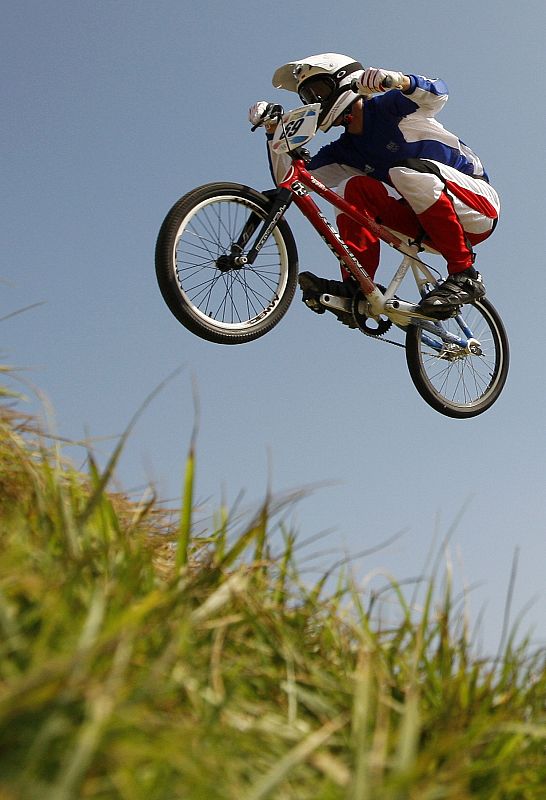 Damien Godet of France races during the men's semifinal run for the BMX cycling competition at the Beijing 2008 Olympic Games