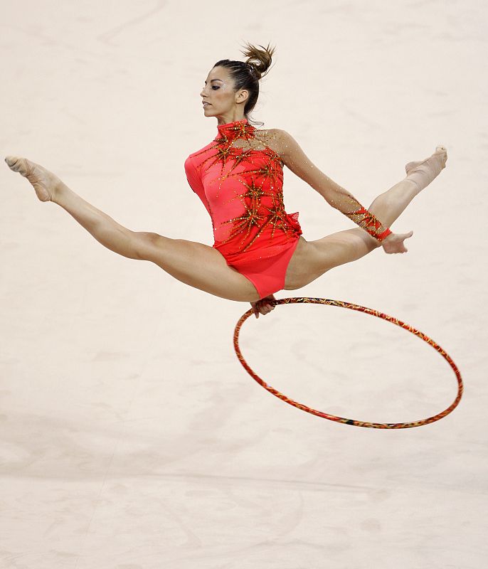 Almudena Cid of Spain performs with the hoop during the individual all-around final of the rhythmic gymnastics competition at the Beijing 2008 Olympic Games