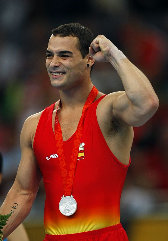 Gervasio Deferr of Spain celebrates winning the silver medal in the men's floor excercise at the Beijing 2008 Olympic Games