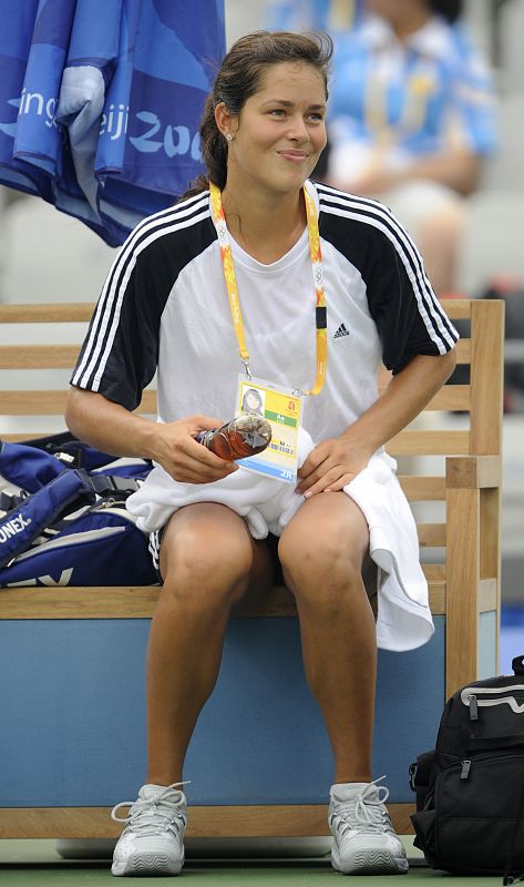 Ana Ivanovic of Serbia sits during a tennis practice session ahead of the Beijing 2008 Olympic Games