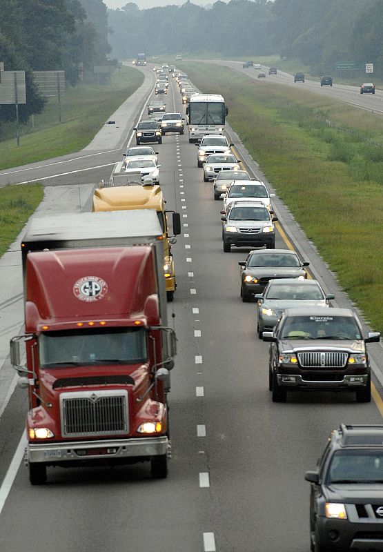 Vehicles carrying Hurricane Gustav evacuees travel along the I-10 interstate highway heading east near Ocean Springs, Mississippi