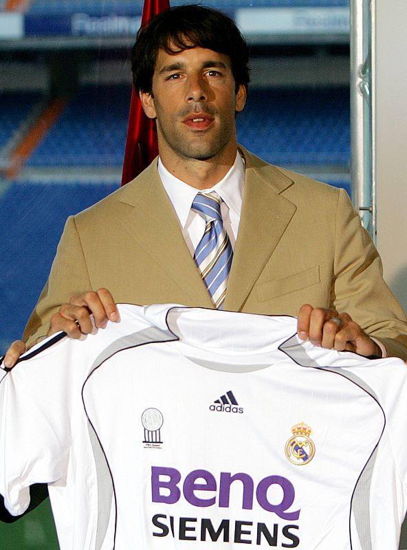 Ruud van Nistelrooy poses with team jersey during his presentation in Madrid