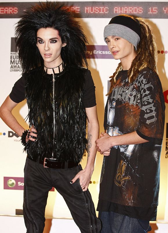 Bill Kaulitz and Tom Kaulitz of German group Tokio Hotel pose on the red carpet before the MTV Europe Music Awards ceremony in Liverpool