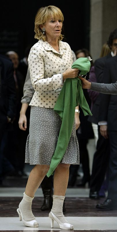 Aguirre, Madrid regional president, arrives at a news conference at regional headquarters in central Madrid