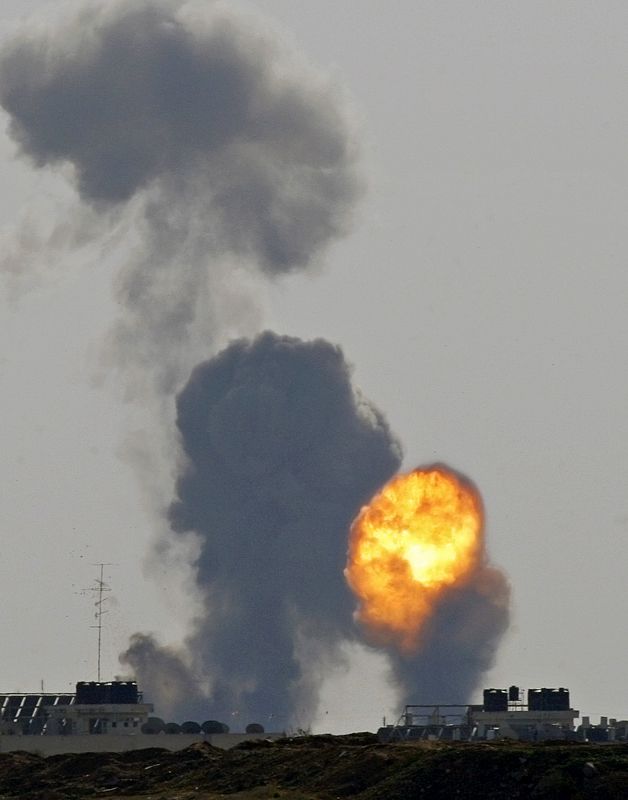 Smoke and fire after an Israeli air strike in northern Gaza