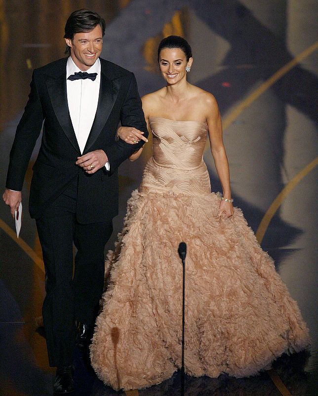 Actors Hugh Jackman and Penelope Cruz walk on stage at 79th Annual Academy Awards in Hollywood