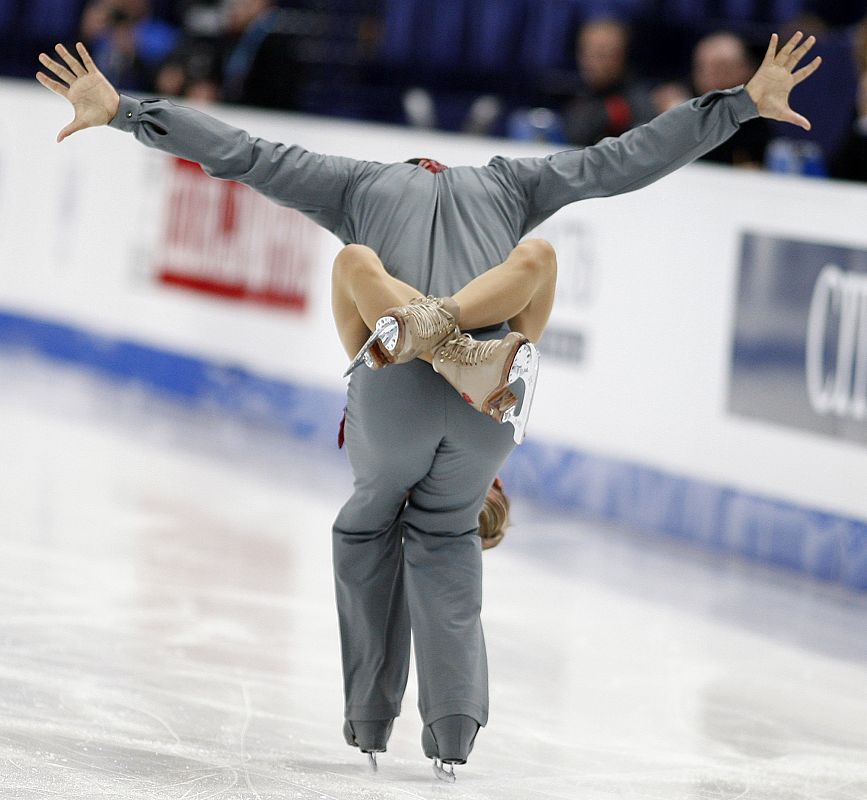 Savchenko and Szolkowy of Germany perform during the pairs free program at the European Figure Skating Championships in Helsinki