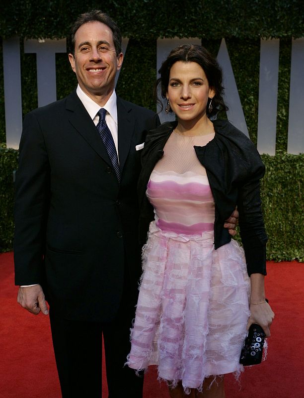 Actor Jerry Seinfeld and his wife Jessica pose as they arrive at the 2009 Vanity Fair Oscar Party in West Hollywood