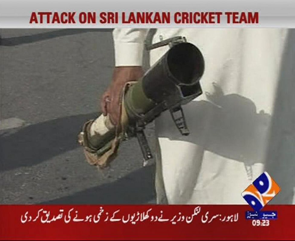 A video grab shows a man holding a rocket launcher after an attack by unidentified gunmen in Lahore