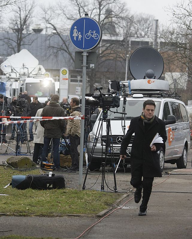 Media gathers near the Albertville-Realschule school where a shooting incident took place in Winnenden