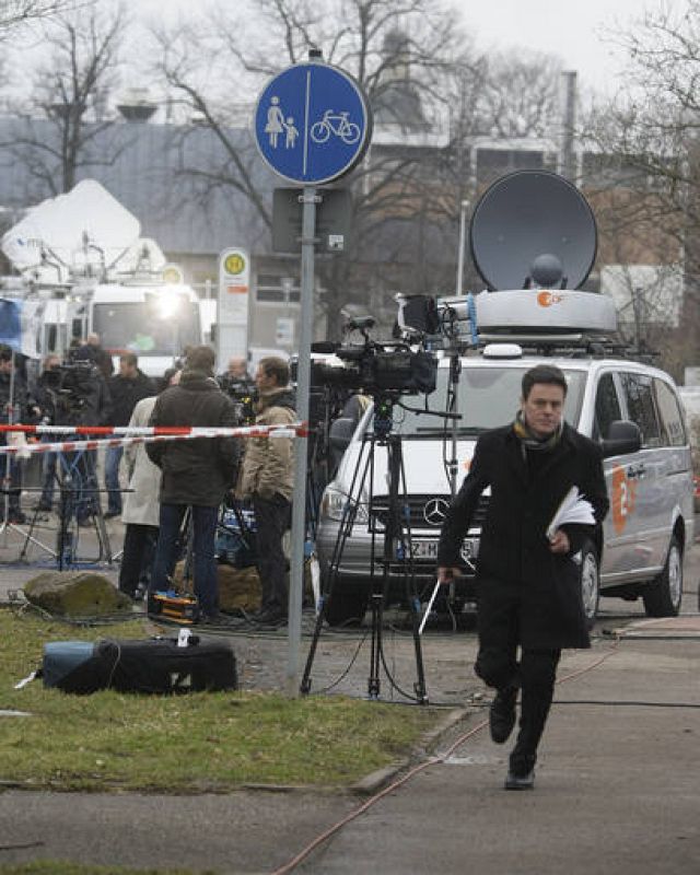 Media gathers near the Albertville-Realschule school where a shooting incident took place in Winnenden