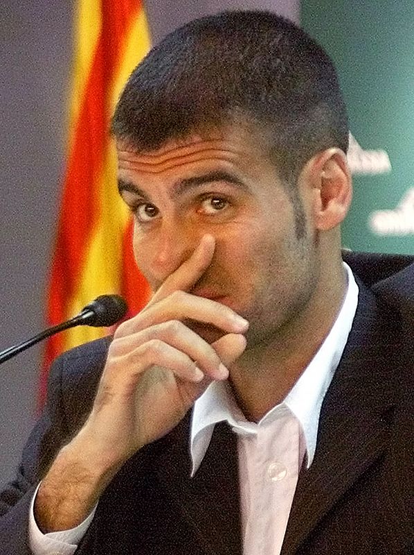 BARCELONA'S CAPTAIN GUARDIOLA GESTURES AS HE ANNOUNCES DECISION TO LEAVE CLUB.