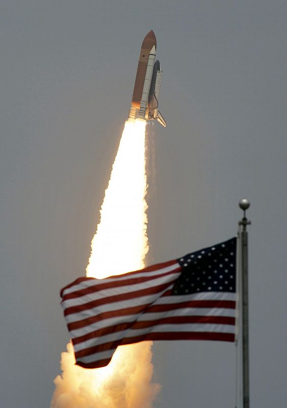 Space shuttle Atlantis lifts off from the Kennedy Space Center in Cape Canaveral