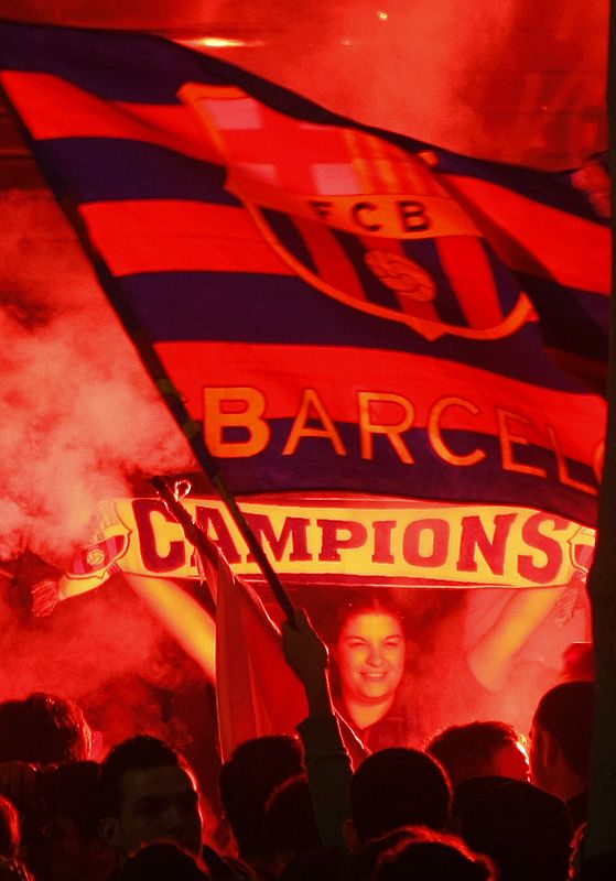 Barcelona's supporters celebrate after their team became the Spanish first division champions for the 19th time at Barcelona's Ramblas