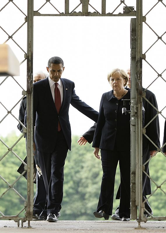 US President Obama and German Chancellor Merkel leave the former Buchenwald Nazi concentration camp