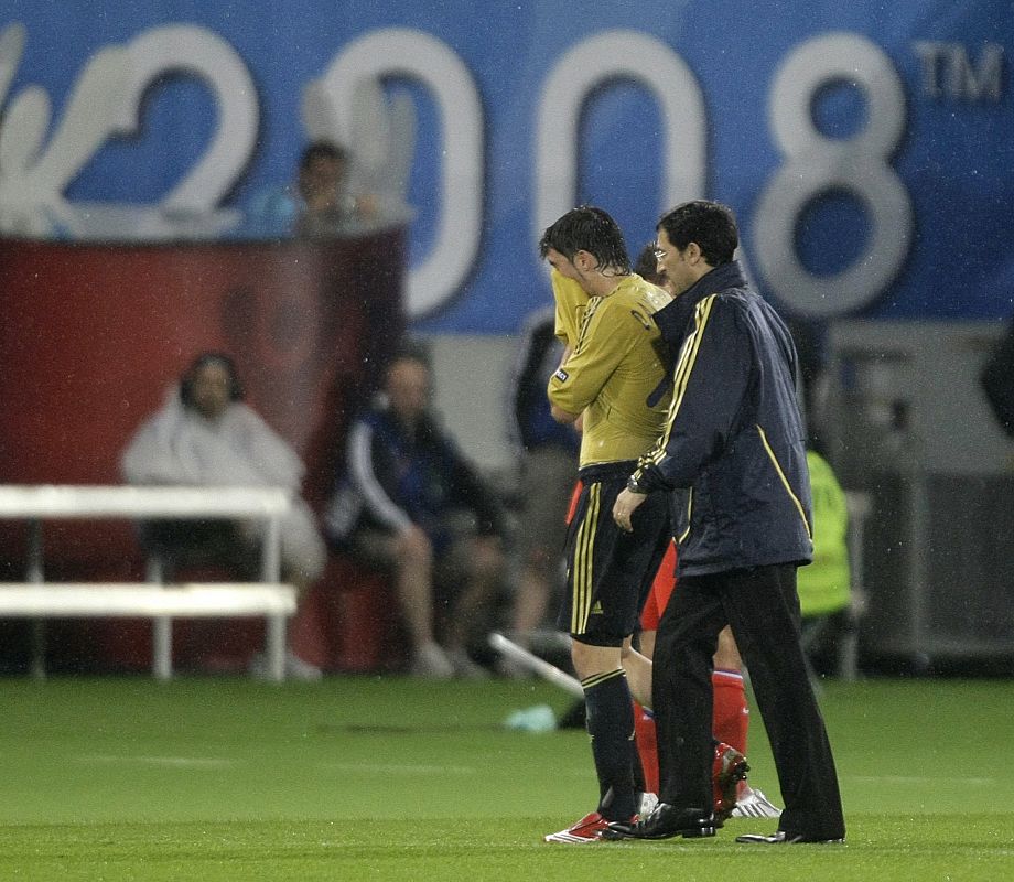 Spain's Villa is escorted off pitch during Euro 2008 semi-final against Russia in Vienna