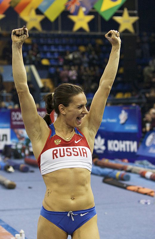 Russia's Isinbayeva celebrates after setting new world record at the 'Pole Vault Stars' indoor event in Donetsk
