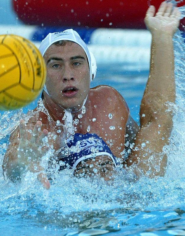 GUILLERMO MOLINA OF SPAIN FIGHTS FOR THE BALL WITH MILAN CIPOV OF