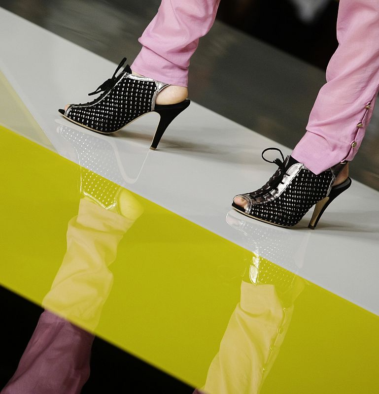 A model displays an outfit by "Ailanto" during Cibeles Madrid Fashion Week Spring/Summer 2010 show in Madrid