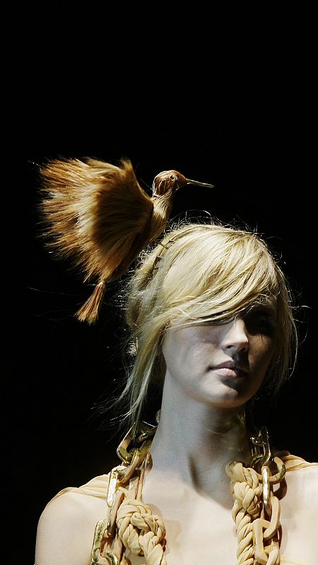 A model displays an outfit from designer Nicolas Vaudelet's Spring/Summer 2010 collection during Cibeles Madrid Fashion Week in Madrid