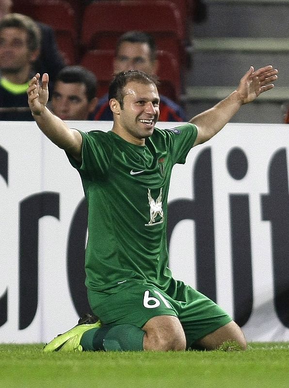 Rubin Kazan's Karadeniz celebrates his goal against FC Barcelona during their Champions League soccer match at the Camp Nou stadium in Barcelona