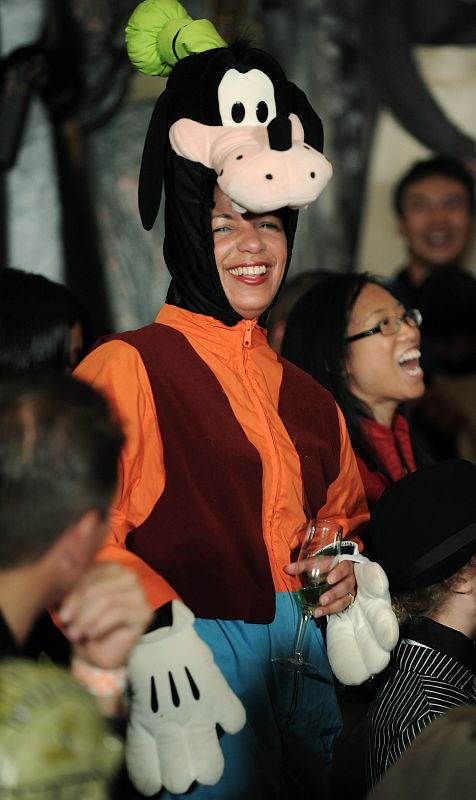 US Ambassador to the UN Rice dresses as Goofy at a reception during Halloween at the White House in Washington