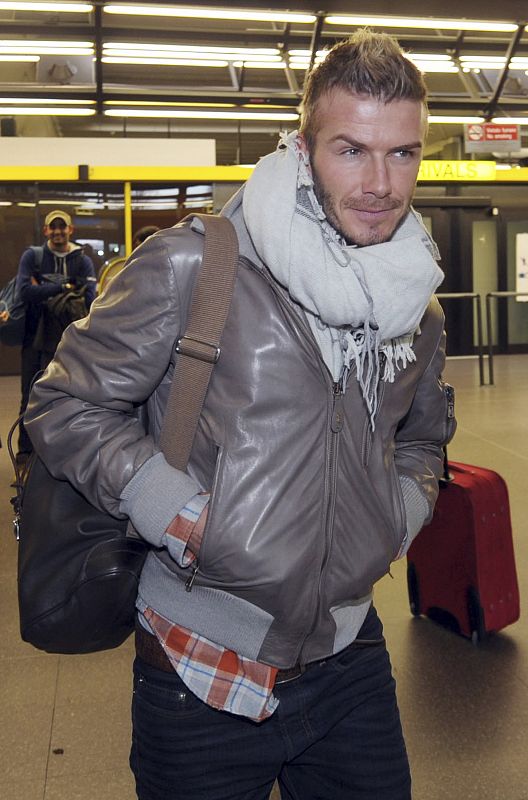 AC Milan's soccer player David Beckham arrives at Malpensa airport around 40 km northwest from Milan