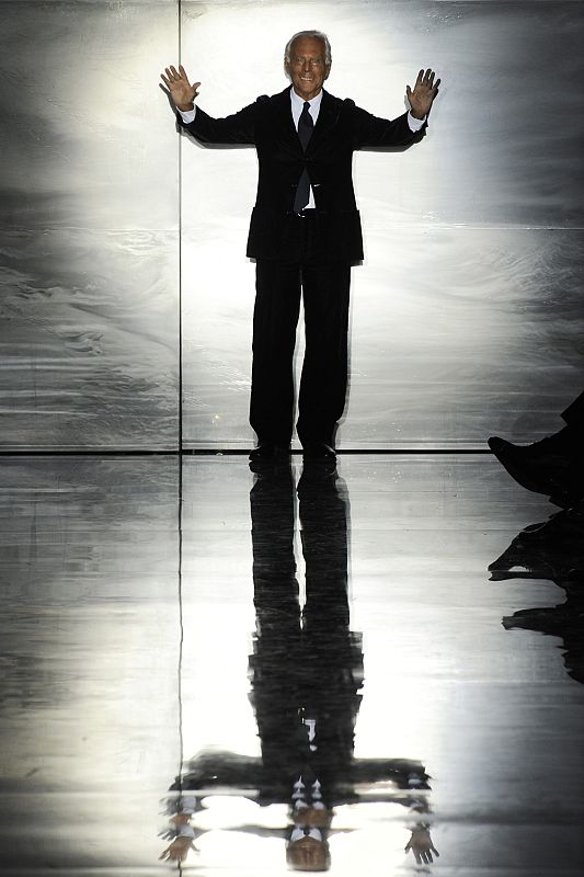 Italian designer Giorgio Armani appears at the end of his Fall-Winter 2010/2011 women's fashion show in Paris