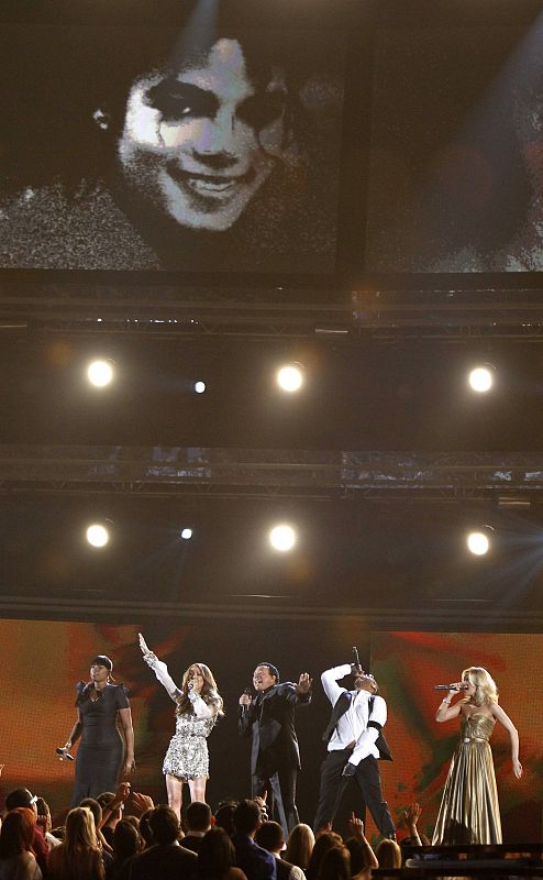 Hudson, Dion, Robinson, Usher, and Underwood sing a tribute to Michael Jackson at the 52nd annual Grammy Awards in Los Angeles