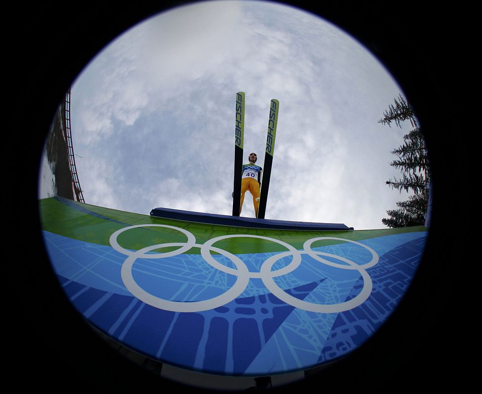 Germany's Bodmer soars through the air during practice round of the individual normal hill ski jumping at the Vancouver 2010 Winter Olympics in Whistler.