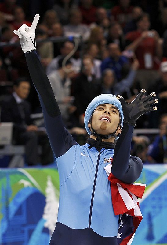 Ohno of the U.S. celebrates after winning the silver medal in the men's 1500 meters short track speed skating final during the Vancouver 2010 Winter Olympics