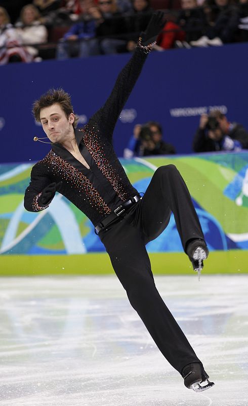 Joubert of France falls during his routine in the men's figure skating short programme at the Vancouver 2010 Winter Olympics