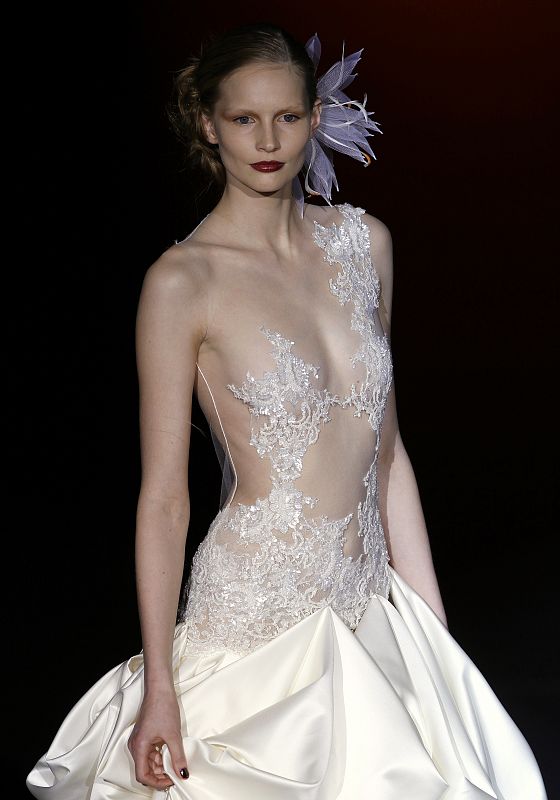 A model displays a creation by Spanish designer Javier Larrainzar during the Cibeles Madrid Fashion Week Fall/Winter 2010 show in Madrid