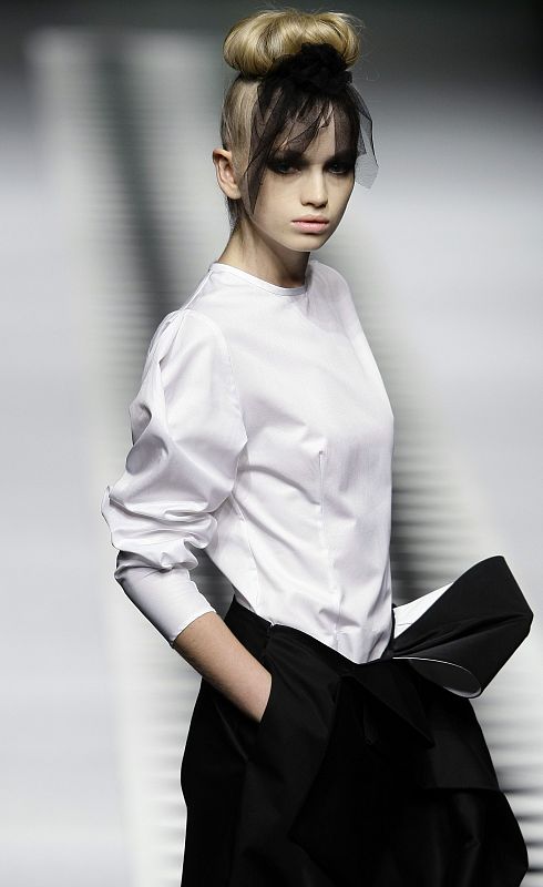 A model displays a creation by designer Barros during the Cibeles Madrid Fashion Week Fall/Winter 2010 show in Madrid