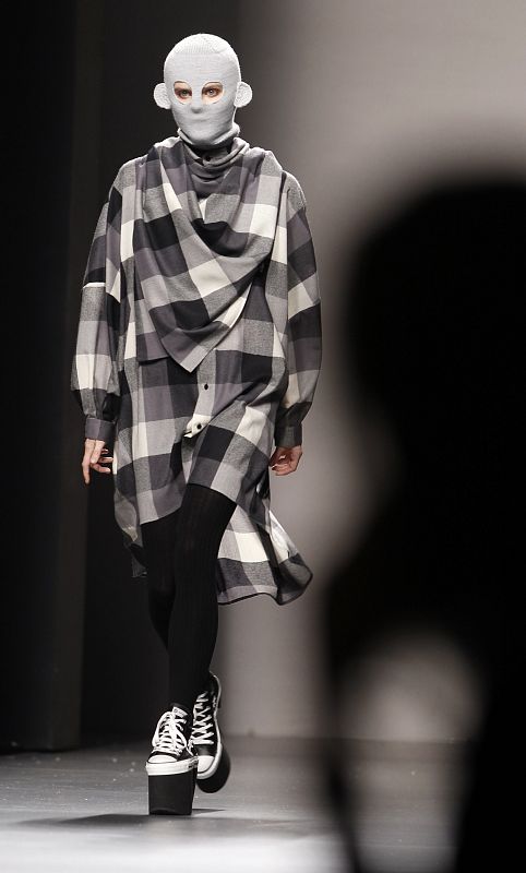 A model presents a creation by Carlos Diez during Cibeles Madrid Fashion Week Fall/Winter 2010 show in Madrid