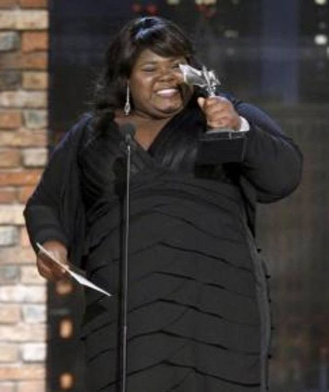 Actress Gabourey Sidibe accepts the award for best female lead at the 25th Film Independent Spirit Awards in Los Angeles