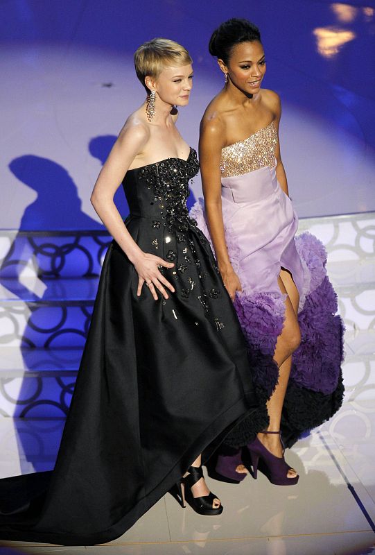 Zoe Saldana and Carey Mulligan take the stage to present an award during the 82nd Academy Awards in Hollywood