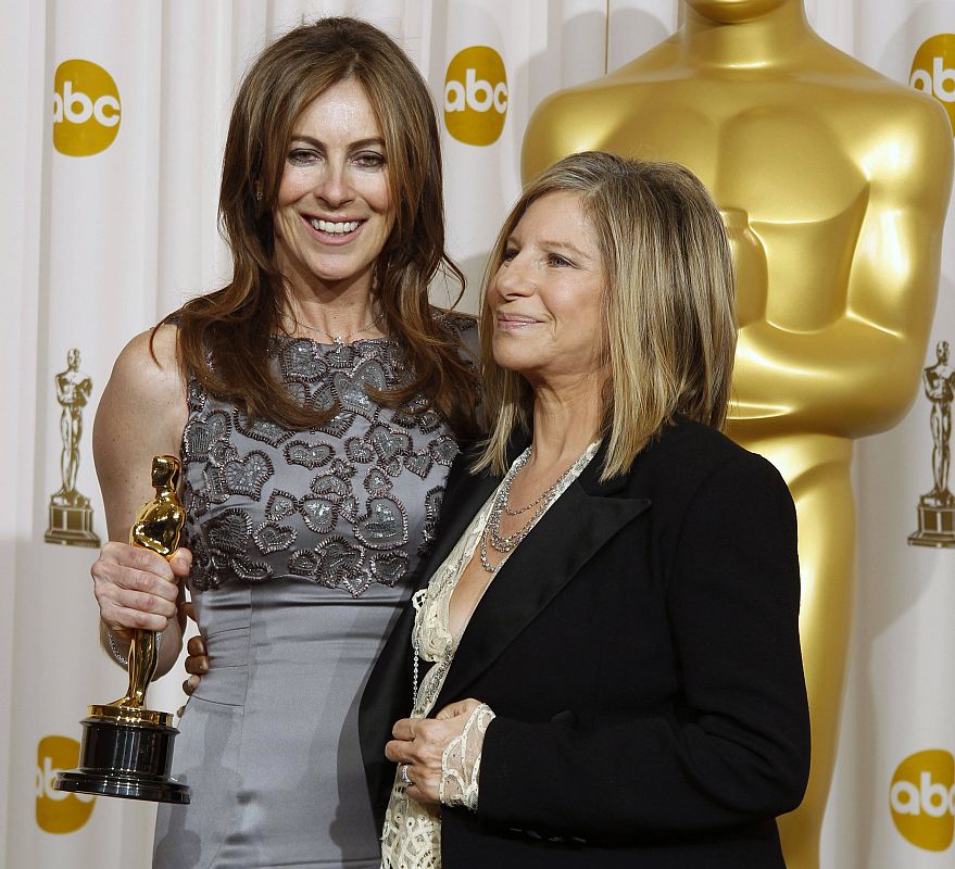 Kathryn Bigelow director of "The Hurt Locker" poses with her Oscar award for best picture with actress and presenter Barbra Streisand