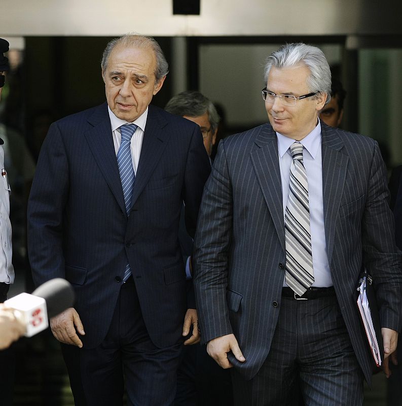 Spain's High Court judge Baltasar Garzon leaves the Spanish Supreme Court in Madrid