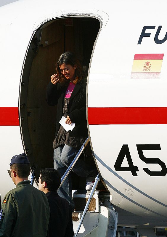 Alicia Gamez walks out of a plane at Barcelona's airport