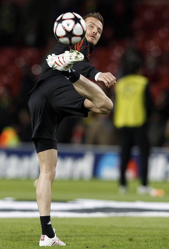 AC Milan's Beckham stretches for the ball before their Champions Leaguematch against Manchester United at Old Trafford in Manchester